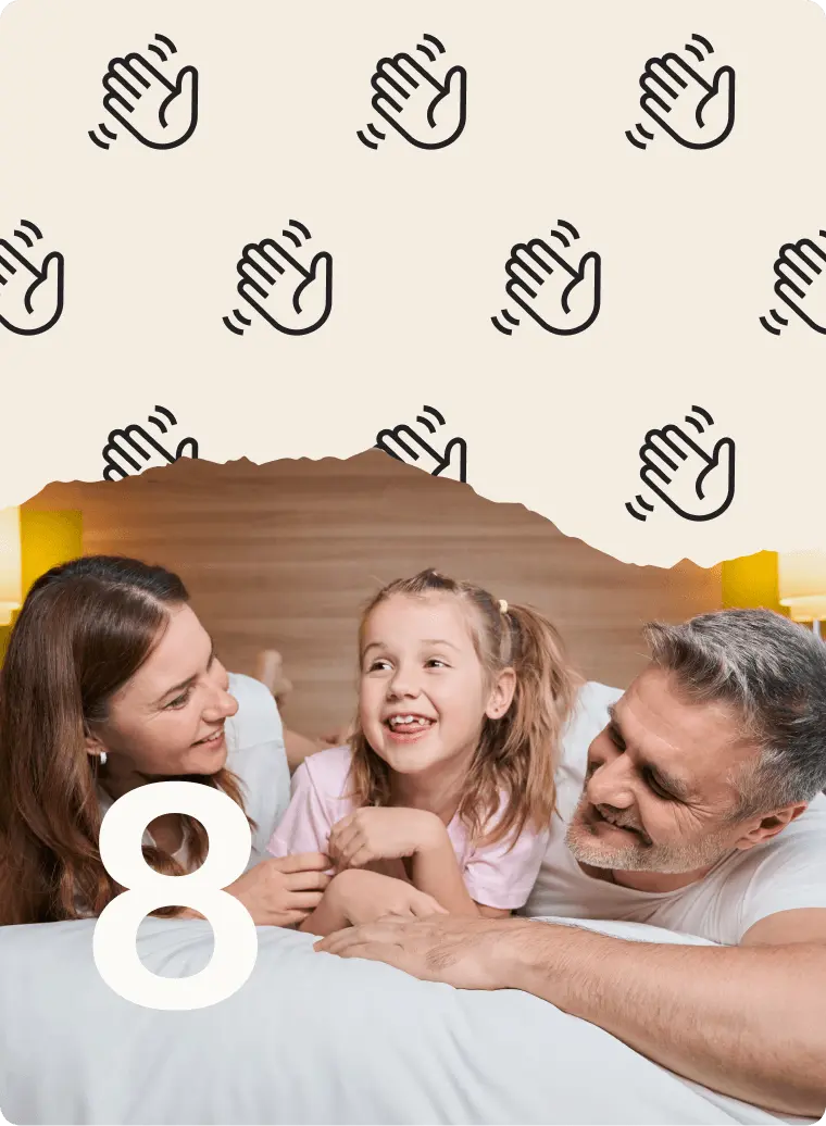 Family of three smiling in bed with waving hand icons above and the number 8 in the corner.