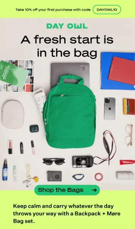 Image shows a back-to-school email marketing campaign from bag brand Day Owl, featuring a gorgeous, aerial-view product shot of one of their backpacks laid out on a flat surface, surrounded by all the back-to-school items that fit in it—from a laptop to a binder to glasses, lipstick, and deodorant. The headline reads, “a fresh start is in the bag,” and the CTA button reads, “shop the bags.” At the top of the email is a neon yellow banner that promises 10% off with a discount code.