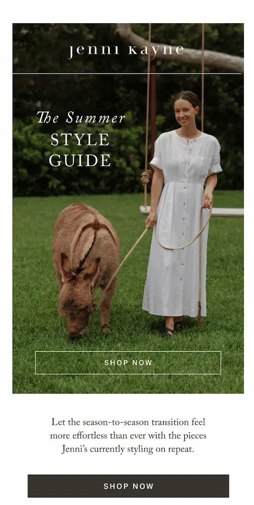 Image shows a seasonal email campaign from apparel brand Jenni Kayne, featuring a photo of a model wearing one of the brand’s dresses and walking in a field with a donkey on a leash. The email copy reads, “The summer style guide: let the season-to-season transition feel more effortless than ever with the pieces Jenni’s currently styling on repeat.” It ends with a “shop now” CTA button.