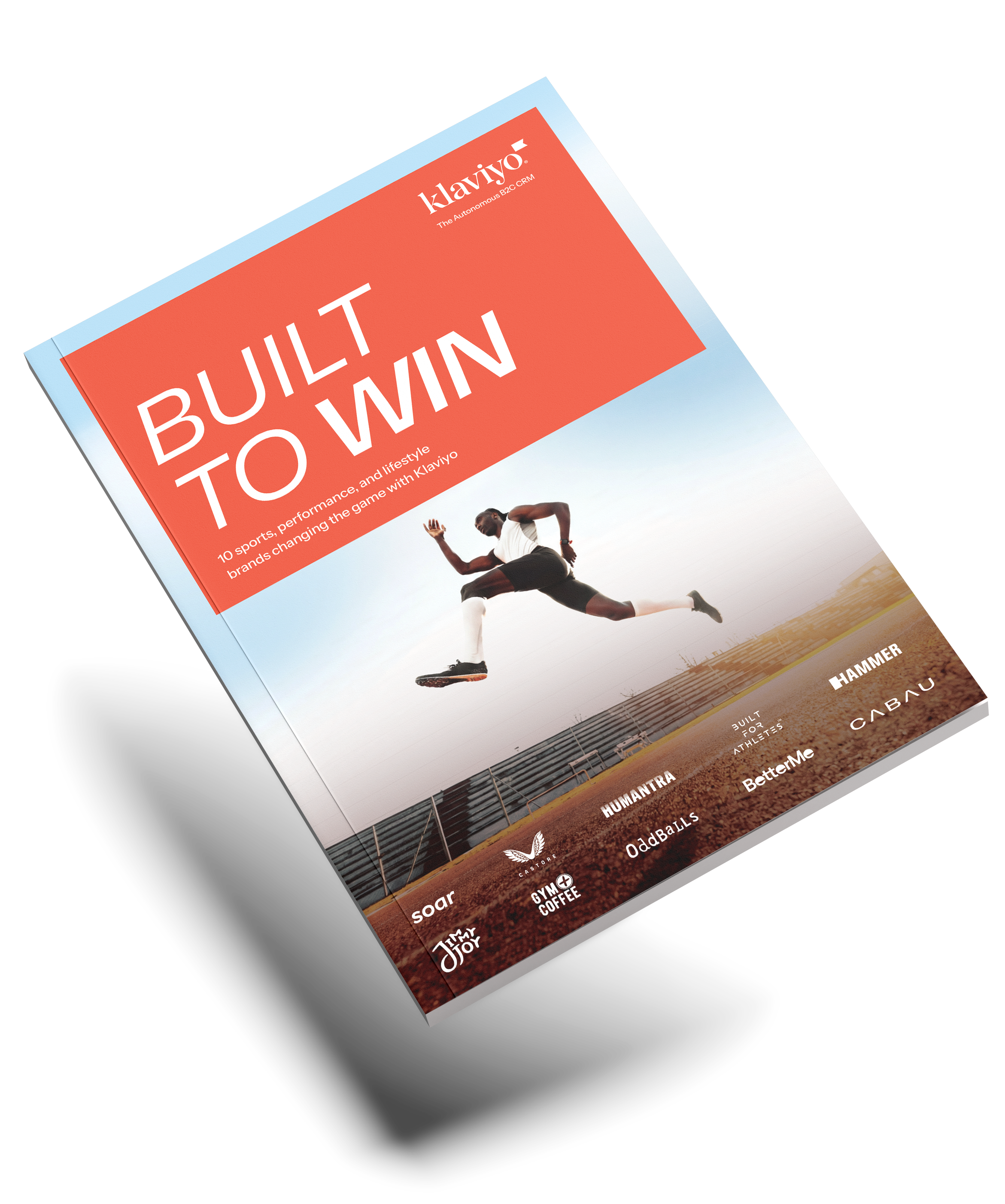 A tilted Klaviyo 'Built To Win' magazine with a runner jumping over hurdles on its cover.