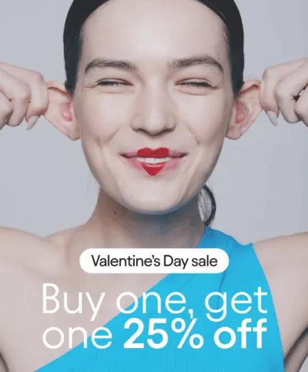 Smiling person with heart-shaped lipstick, pulling ears. Text: "Valentine's Day sale. Buy one, get one 25% off.