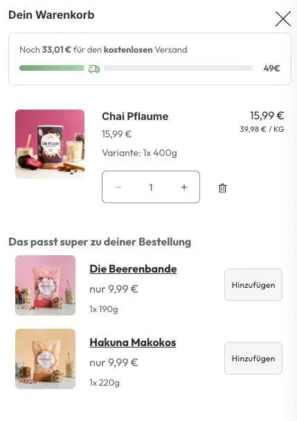 Dein Warenkorb zeigt "Chai Pflaume" für 15,99 € an. Vorschläge: "Die Beerenbande" und "Hakuna Makokos" für je 9,99 €.