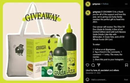 Image shows an Instagram post from olive oil brand Graza, which shows a product illustration of a tote bag, a box of banana sizzle drizzle cake mix, Whole Foods gift card, and two bottles of olive oil. The caption reads, “GIVEAWAY: as a thank you for all of the support and love this year, we’re giving one lucky family member the perfect gift to head into 2023.”