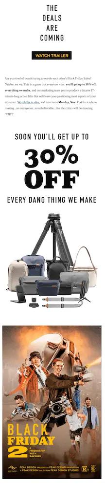 Image shows a Black Friday email example from Peak Design, headlined “the deals are coming” with a CTA button that reads, “watch trailer.” The bottom of the email promises, “soon you’ll get up to 30% off every dang thing we make.”