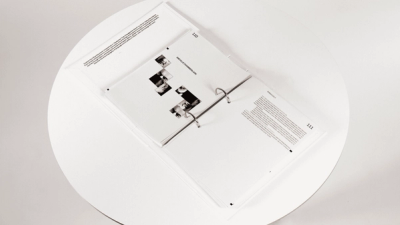 Speeches That Changed the World publication design – open ring binder spread showing Neville Chamberlain chapter with portrait photographs and speech text