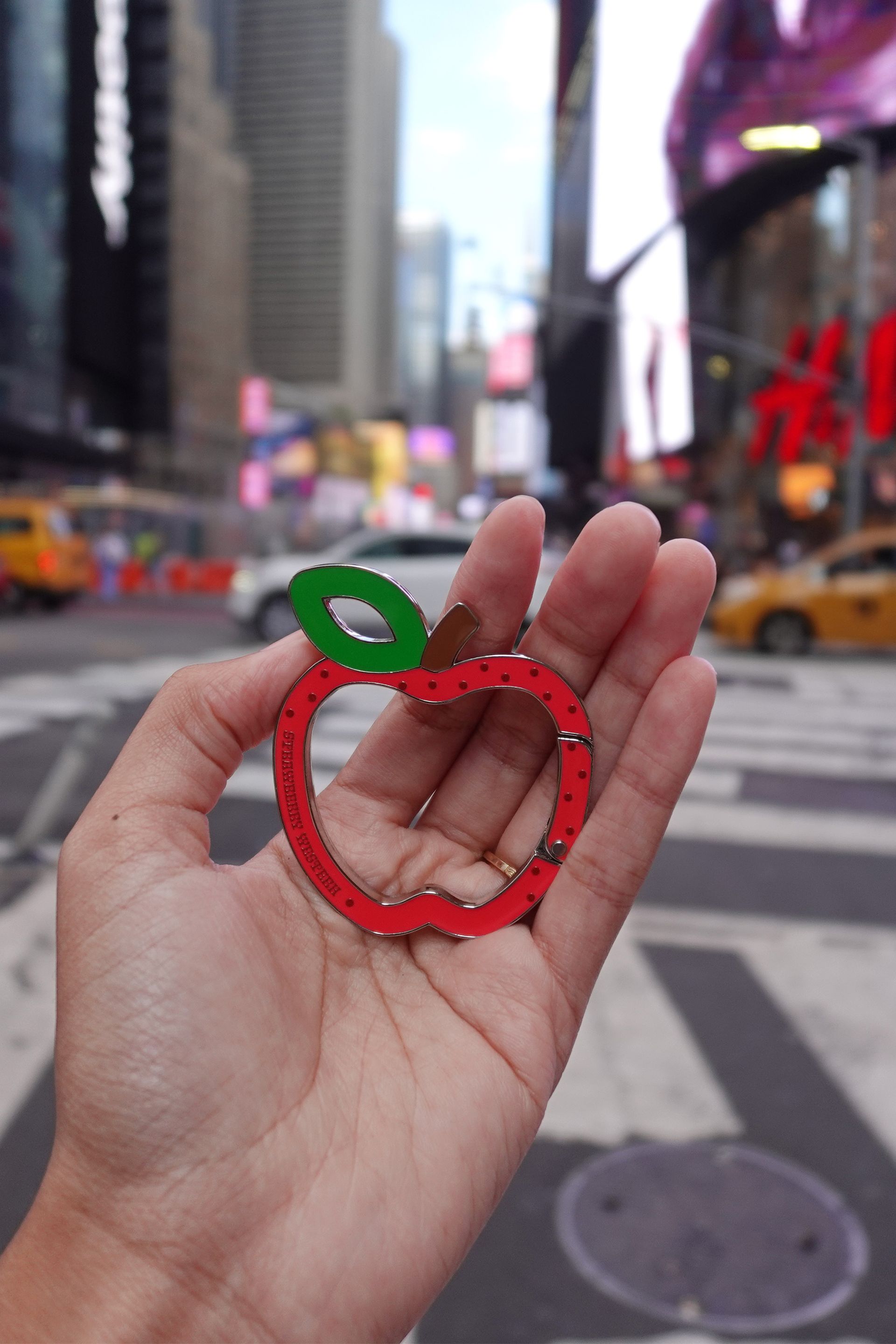 Red apple shaped carabiner keychain clip.