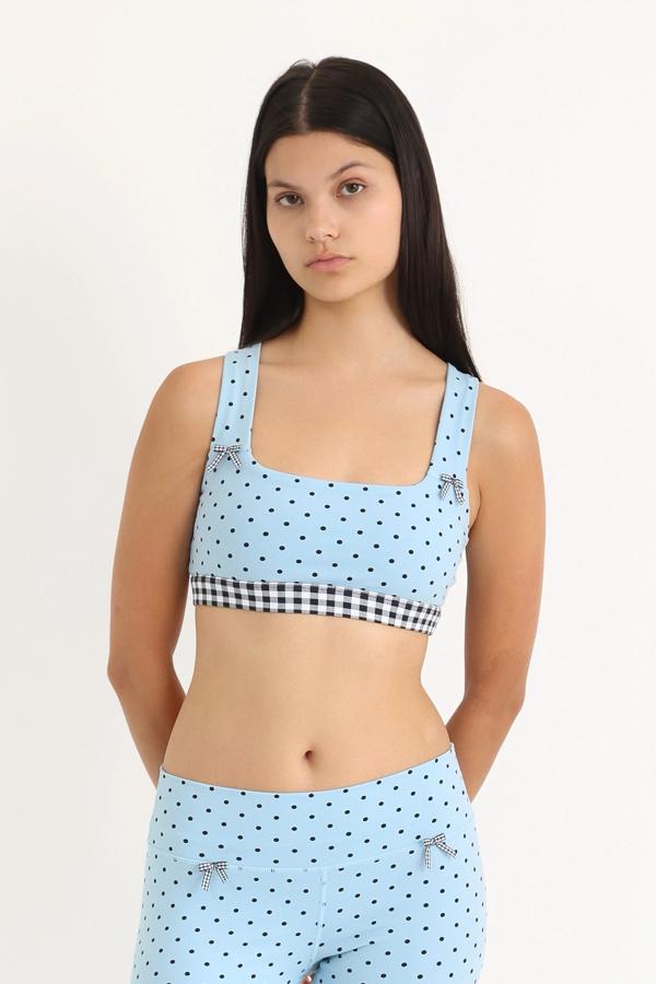 Medium-support Coco Sports Bra in a Blue Polka Dot print, gingham elastic band and ginghams bows at straps.