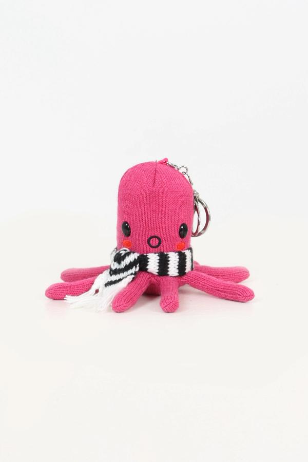 Front view of magenta octopus plushie keychain wearing a scarf. Comes with detachable key ring and key clip for accessorizing.