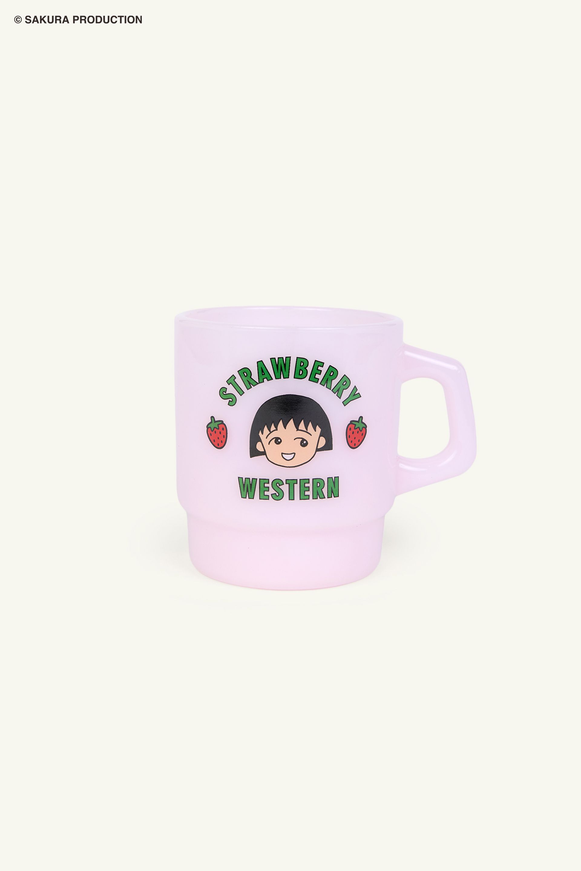Flat image of Pink Chibi Maruko Chan Milky Mug. The front reads Strawberry Western in green lettering. In the middle is Chibi Maruko-chan's face surrounded by two strawberries.