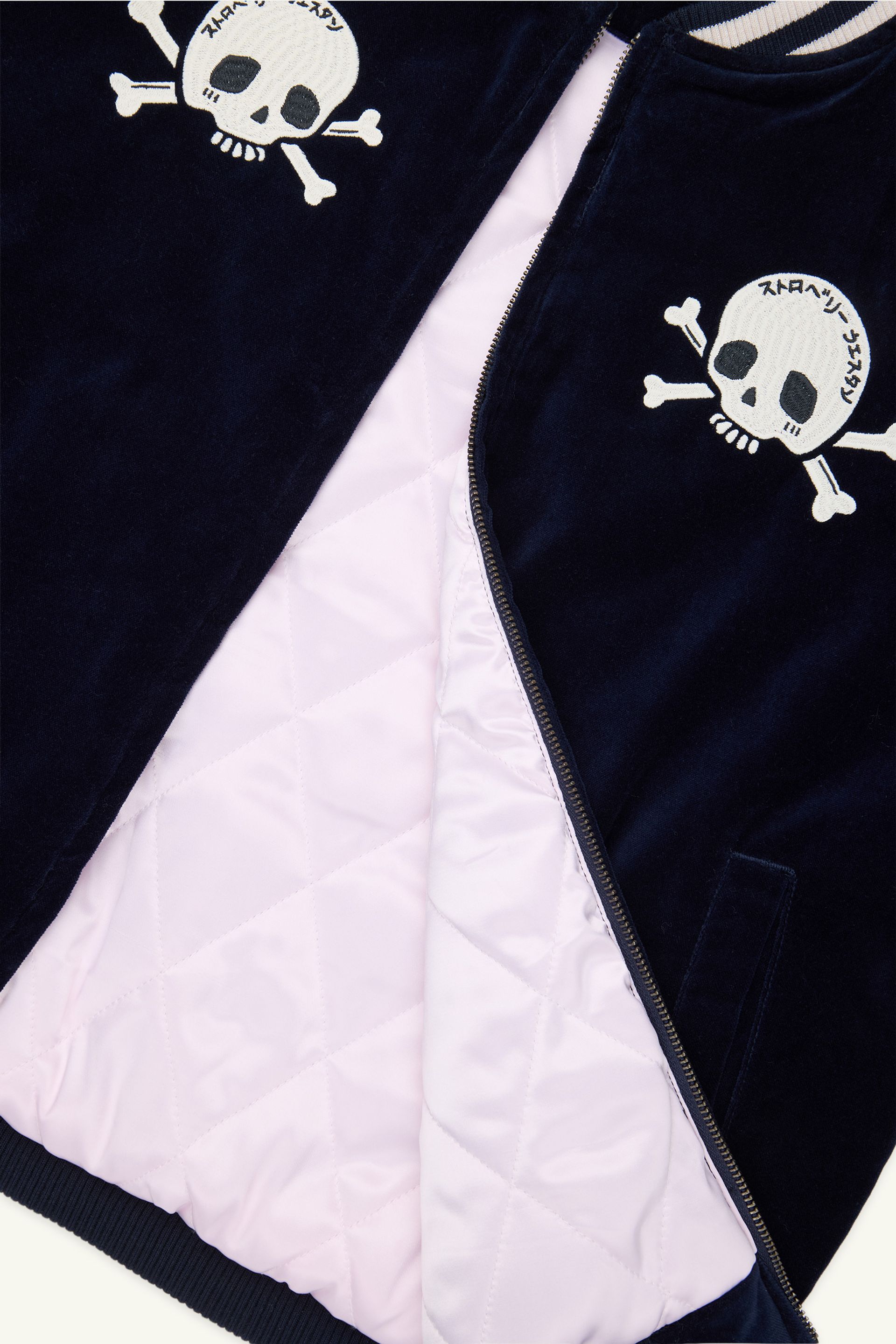 Baby pink interior quilted lining of Navy Sukajan Jacket.