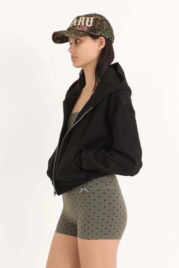 Soft and supportive high-waisted yoga shorts with a fixed 3" inseam in an Olive Polka Dot print with gingham bows at the front.