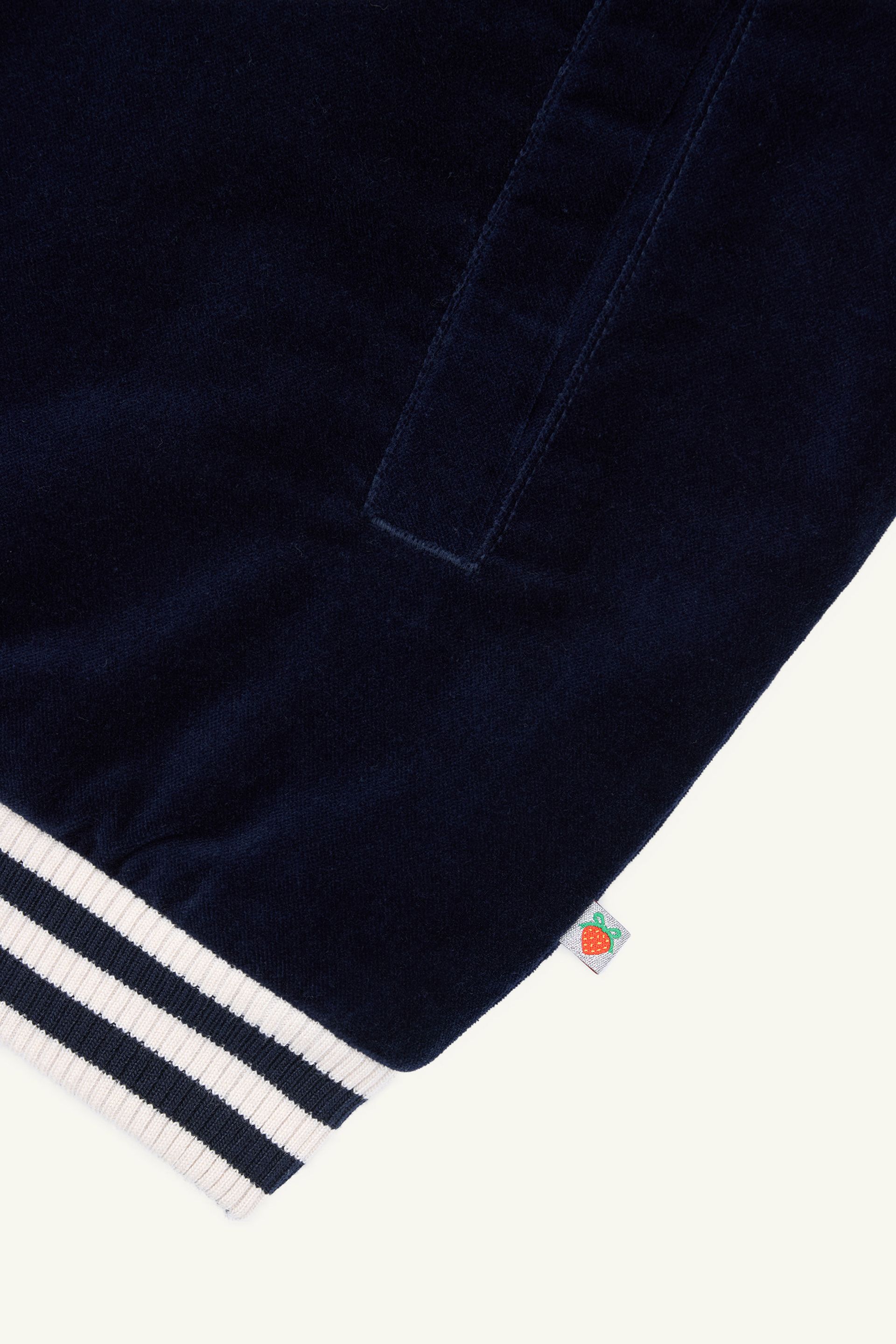 Metallic woven strawberry label detail on Navy Sukajan Jacket.