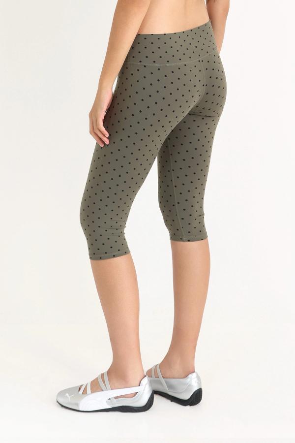 Super flattering, lower-rise capri leggings in an Olive Polka Dot print with gingham bows at the front.