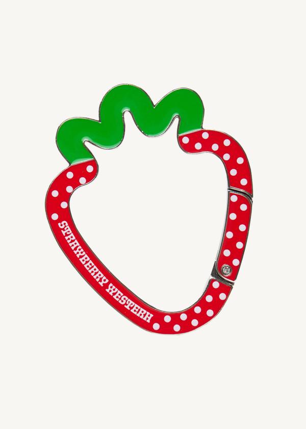 Strawberry shaped metal carabiner in red and green enamel with white polka dots and Strawberry Western logo.