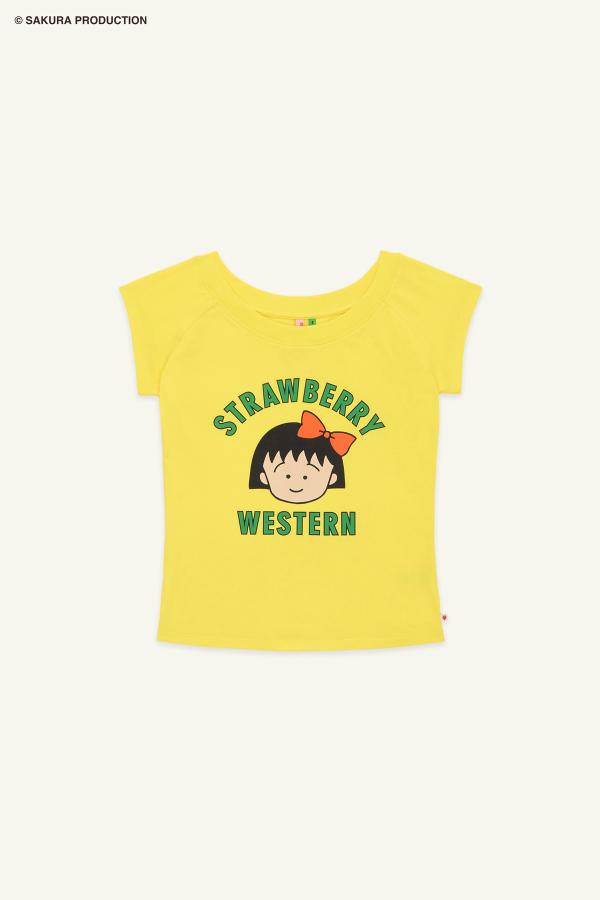 Flat image of the Chibi Maruko Chan Raglan top in Yellow. The shirt reads "Strawberry Western" in green lettering with Chibi Maruko-chan's face in the middle.