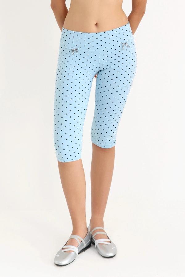 Super flattering, lower-rise capri leggings in a Blue Polka Dot print with gingham bows at the front.