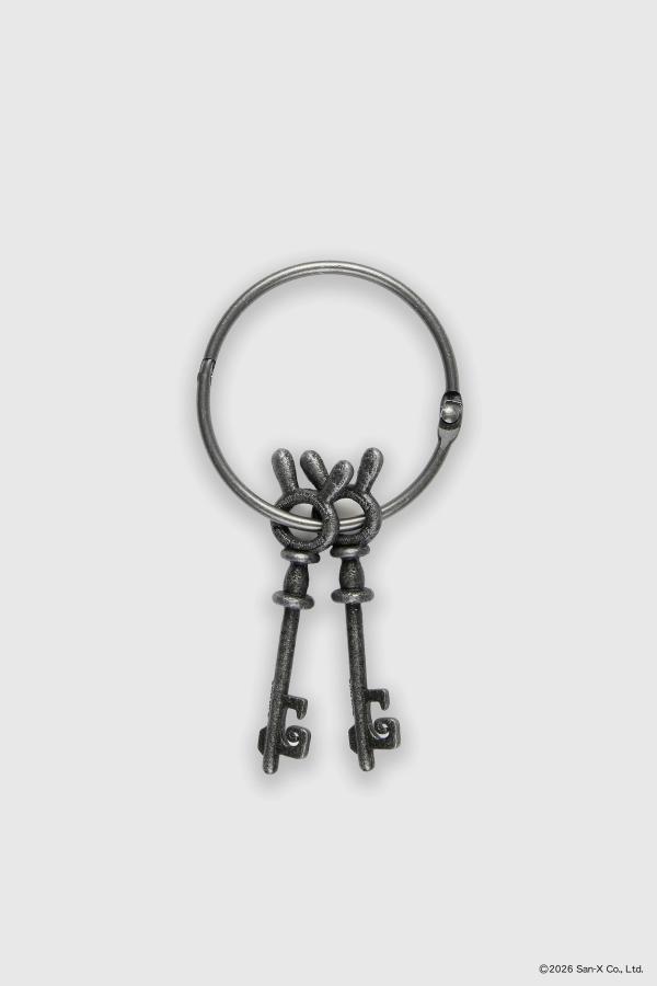 Flat image of a pair of two beautiful and heavy Sentimental Circus skeleton keys on a large hinged, jailer ring. These bunny head keys were brought to life from 2D in a cast iron texture featuring the Sentimental Circus and Strawberry Western logos on both sides.