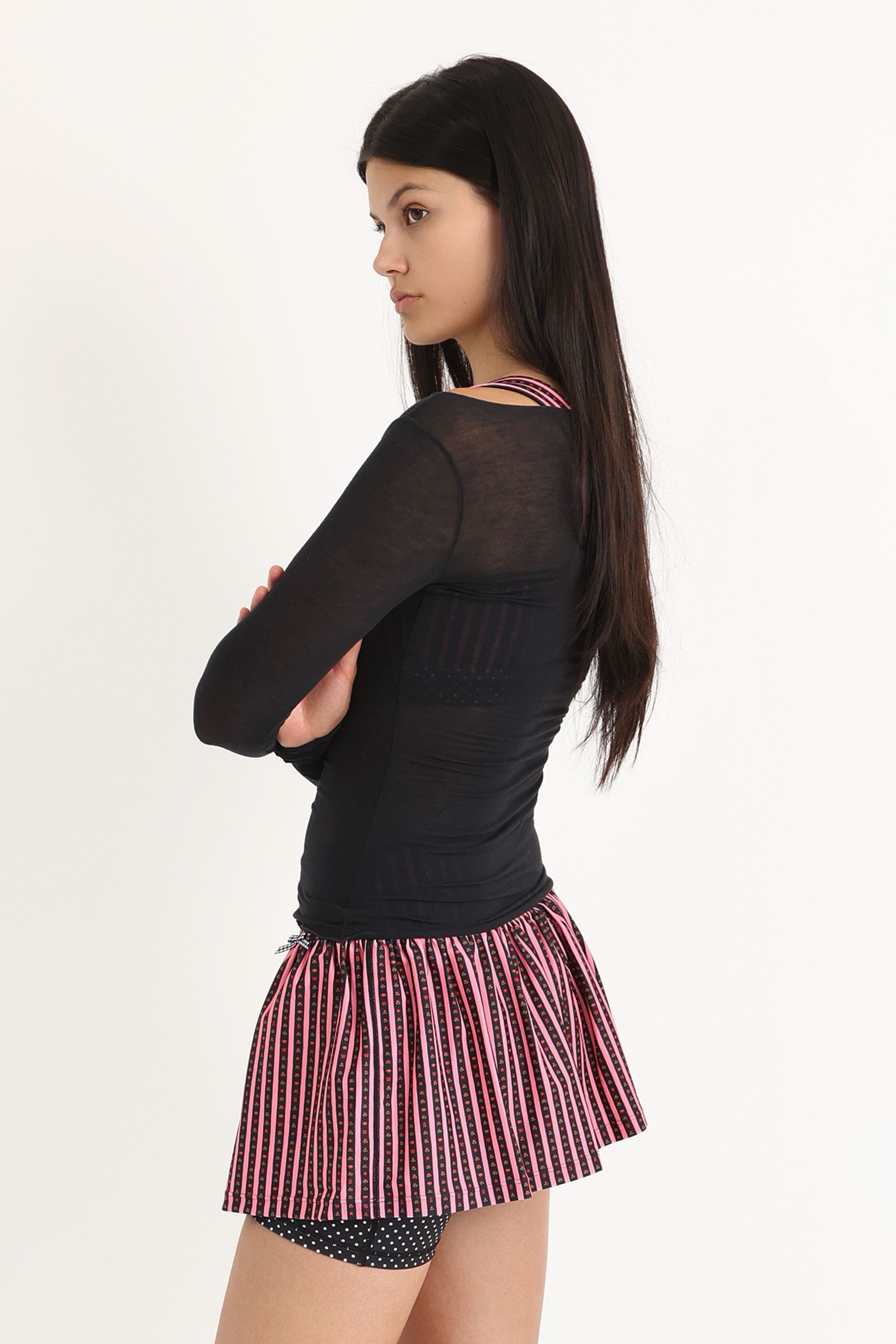 Gathered ruffle exercise skort in a hand-drawn, Pink/Black floral border stripe print with contrast black and white polka dot print and gingham bow details.