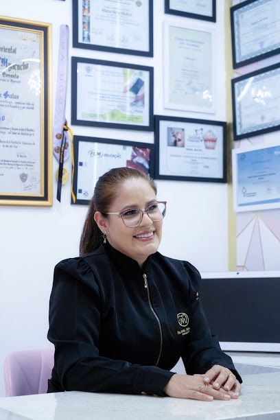 Dra. Maria Nina Munoz - Dentista 24 Horas
