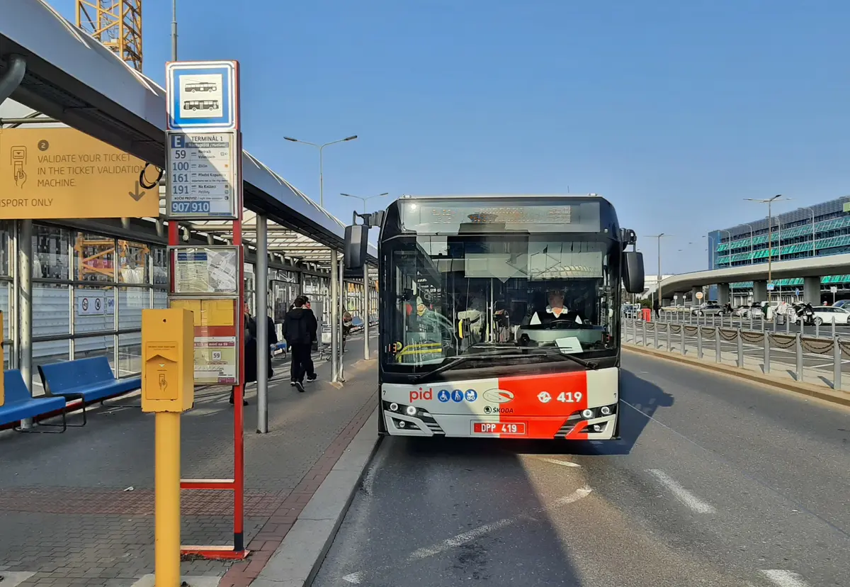 Trolleybus 59 stop in front of Terminal 1 at Prague airport, with the day lines and night lines 907 and 910