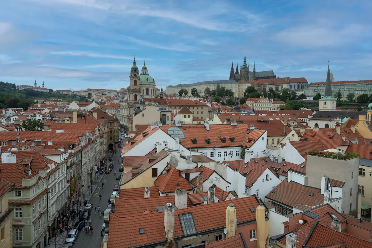 Rooftops of Malá Strana with St. Nicholas Church and Prague Castle in the background