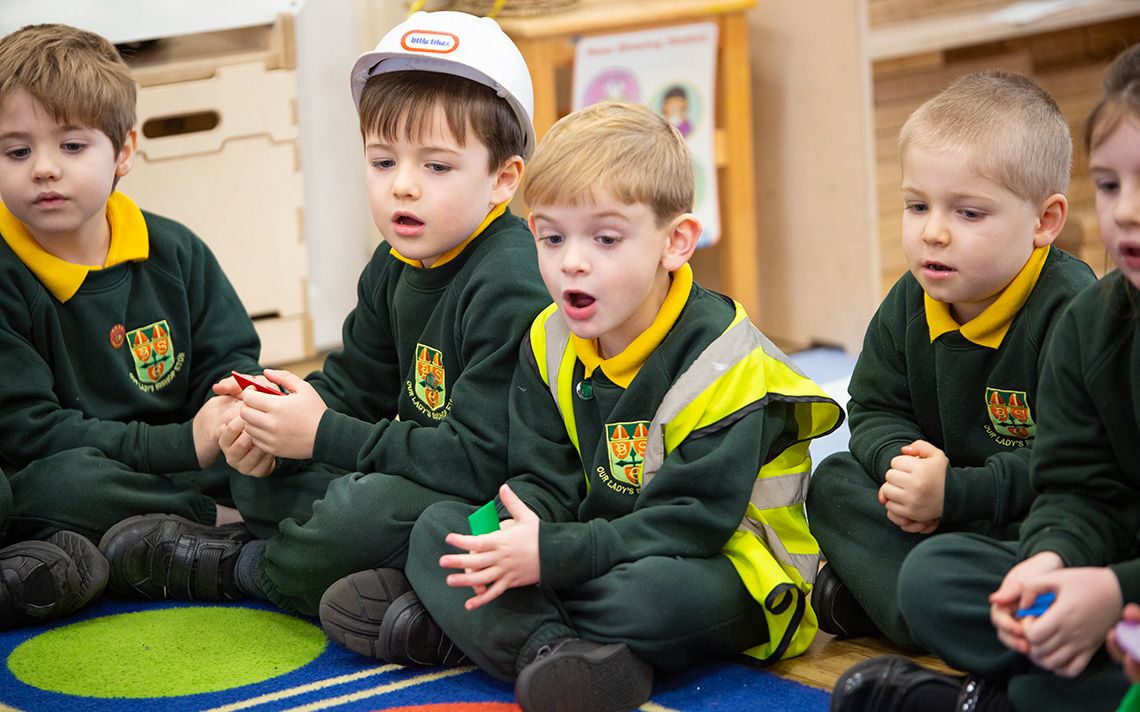 Children at Our Lady's Bishop amazed by demonstration.