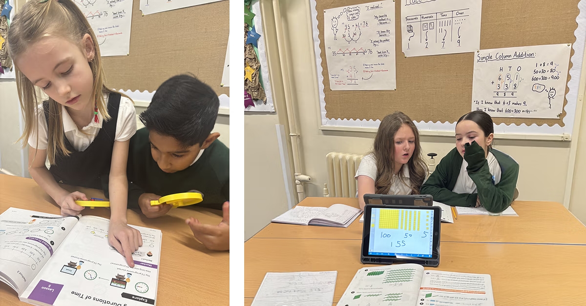 Sandycroft pupils looking at Maths — No Problem! textbook together.