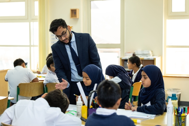 mesaieed school teacher and pupils