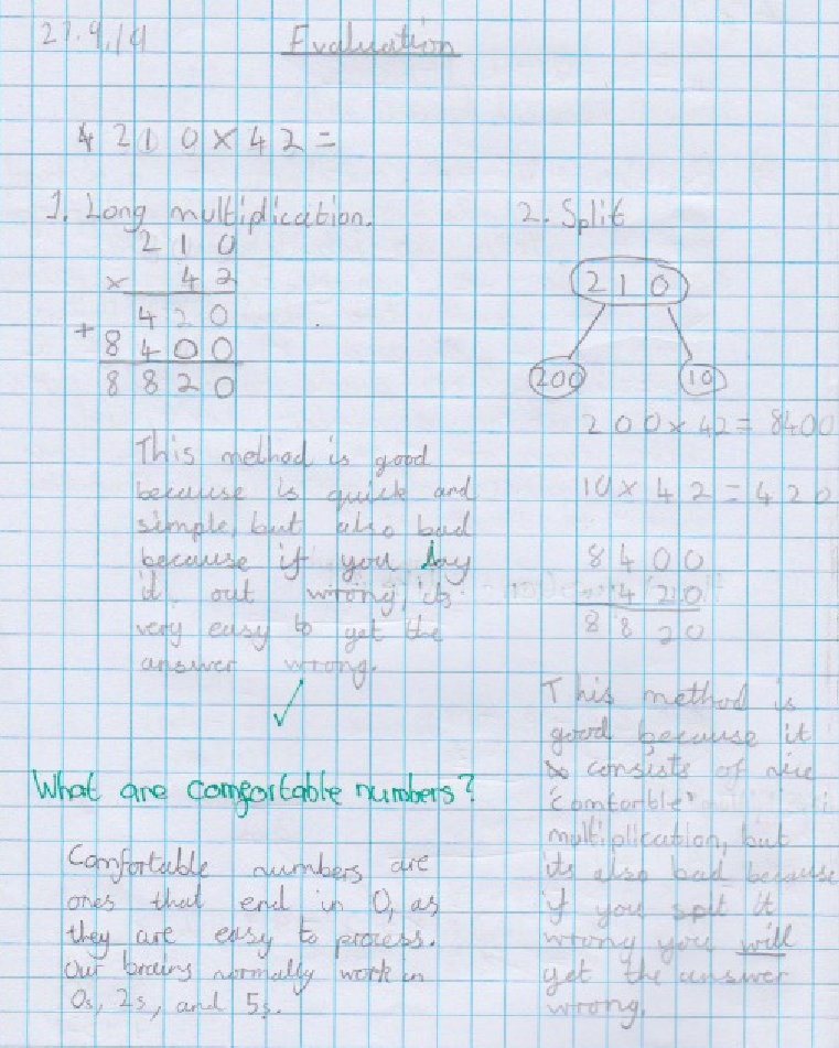 long multiplication done in pupils maths journal to find comfortable numbers