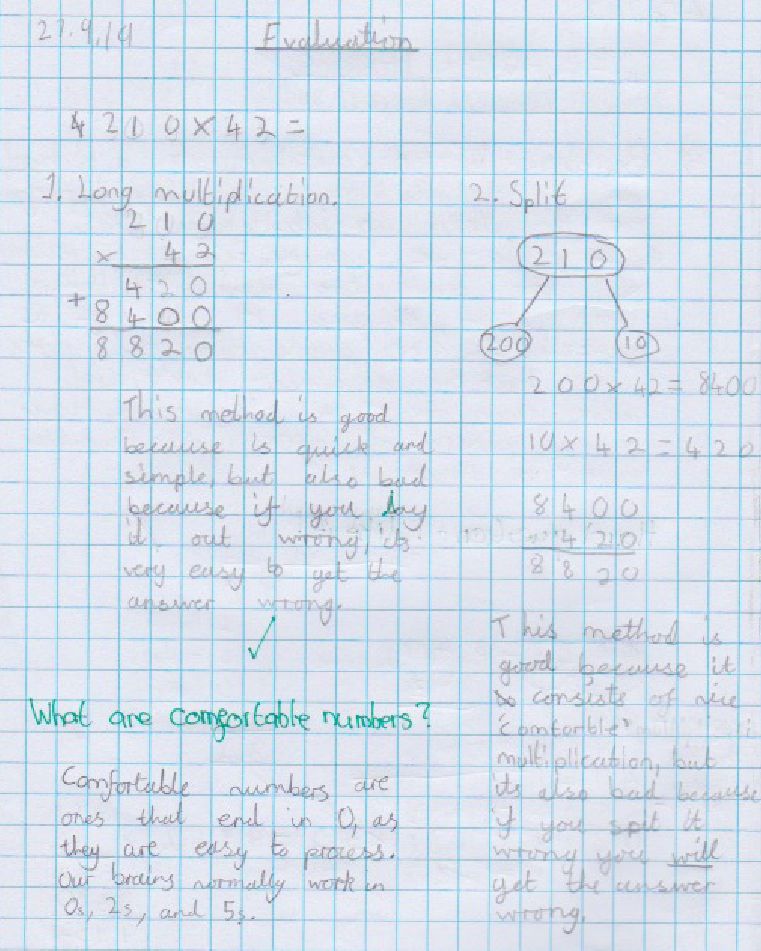 long multiplication done in pupils maths journal to find comfortable numbers