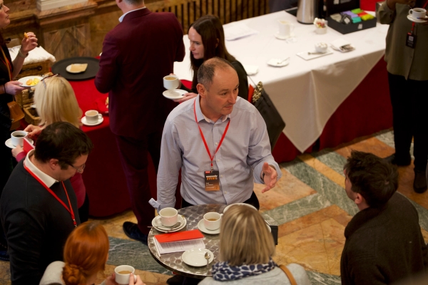 delegates talking during event break