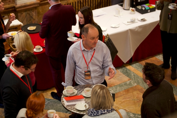 delegates talking during event break