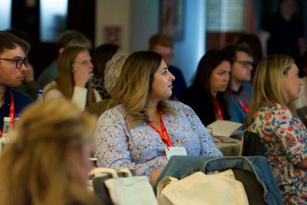 audience member watching conference
