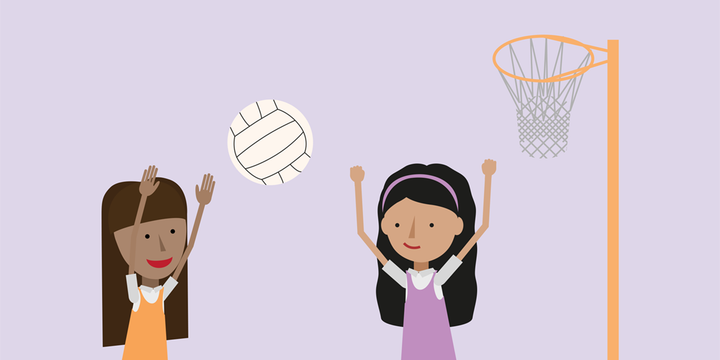 Two maths students playing a game of netball. The girl on the left is taking a show while the girl on the right is defending.