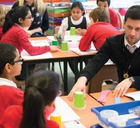 Licensed Maths — No Problem! Trainer Ben Tudor teaching primary maths to students