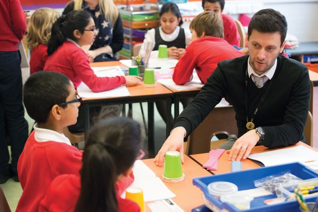 Teacher speaking to pupils