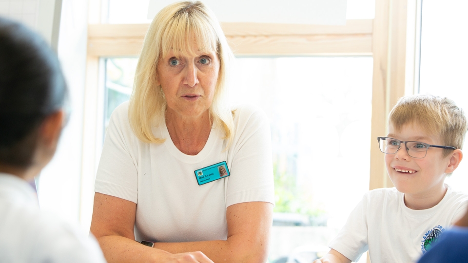 Debbie Lewis from Langley Green Primary School talks with children