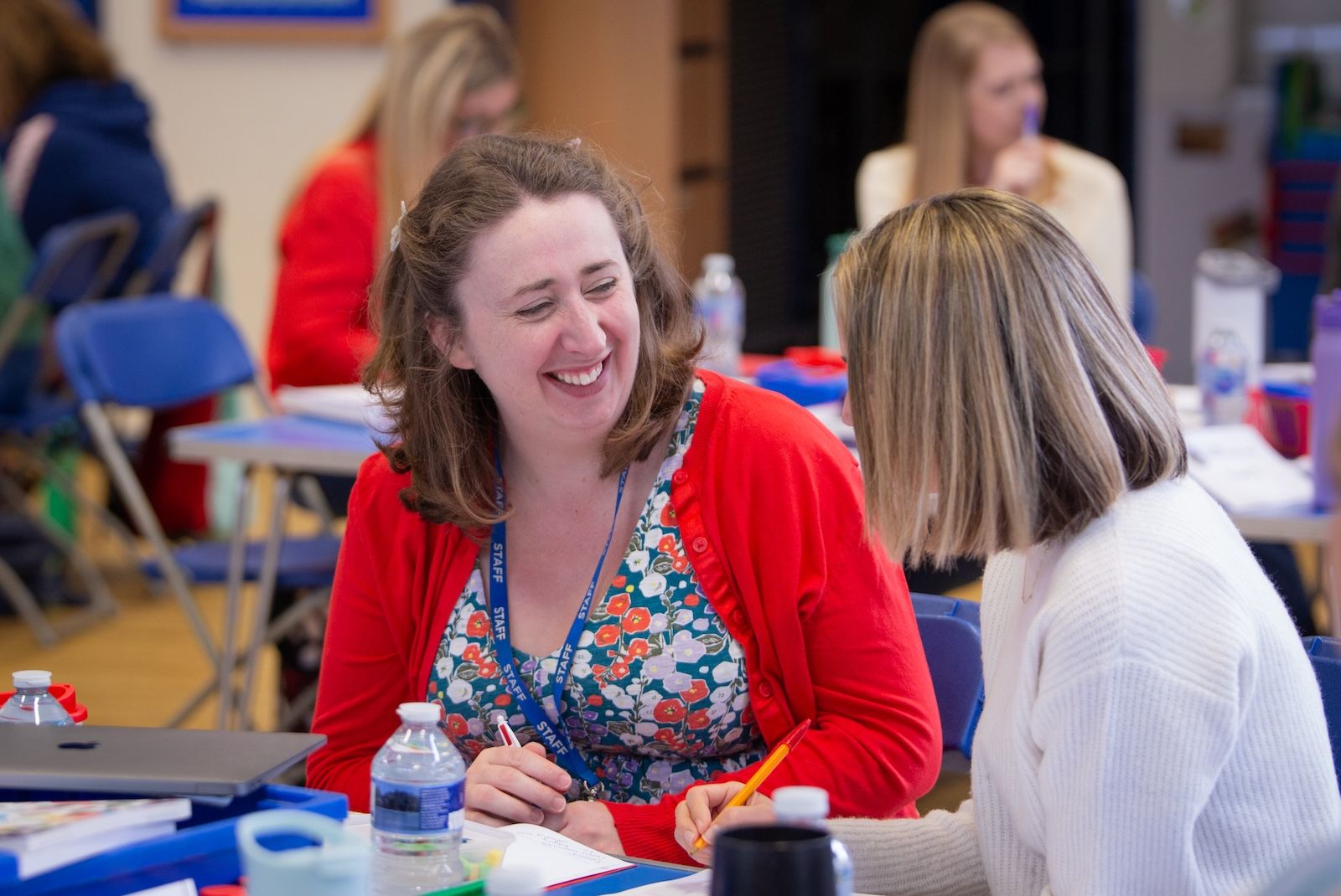 Excelsior Trust teachers talking to each other