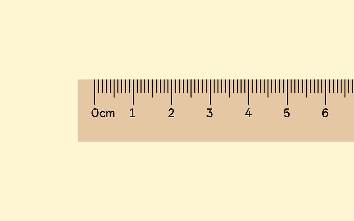 A brown ruler measuring from 0 to 6 centimetres