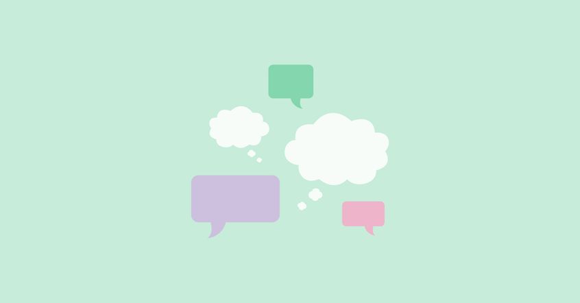 A cluster of thought and speech bubbles. 3 Speech bubbles in purple, green and pink, and 2 white thought bubbles