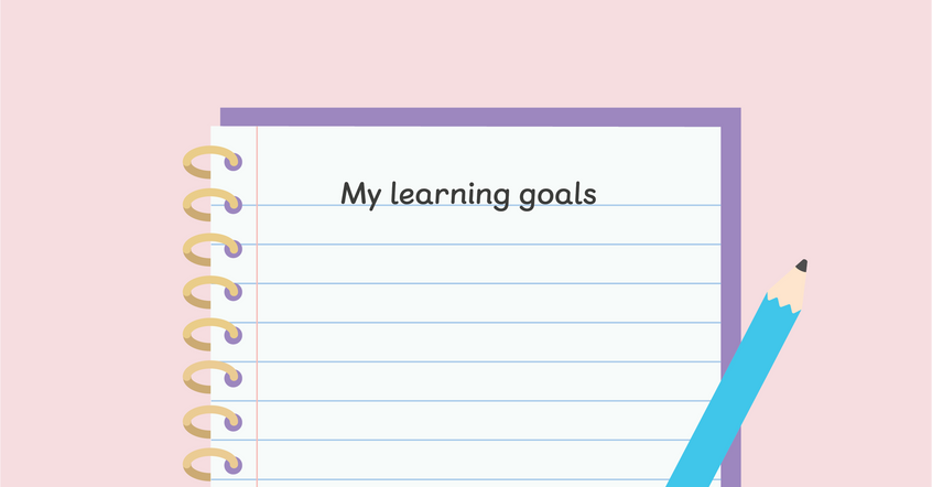 "my learning goals" written on a notepad with a blue pencil on a pink background
