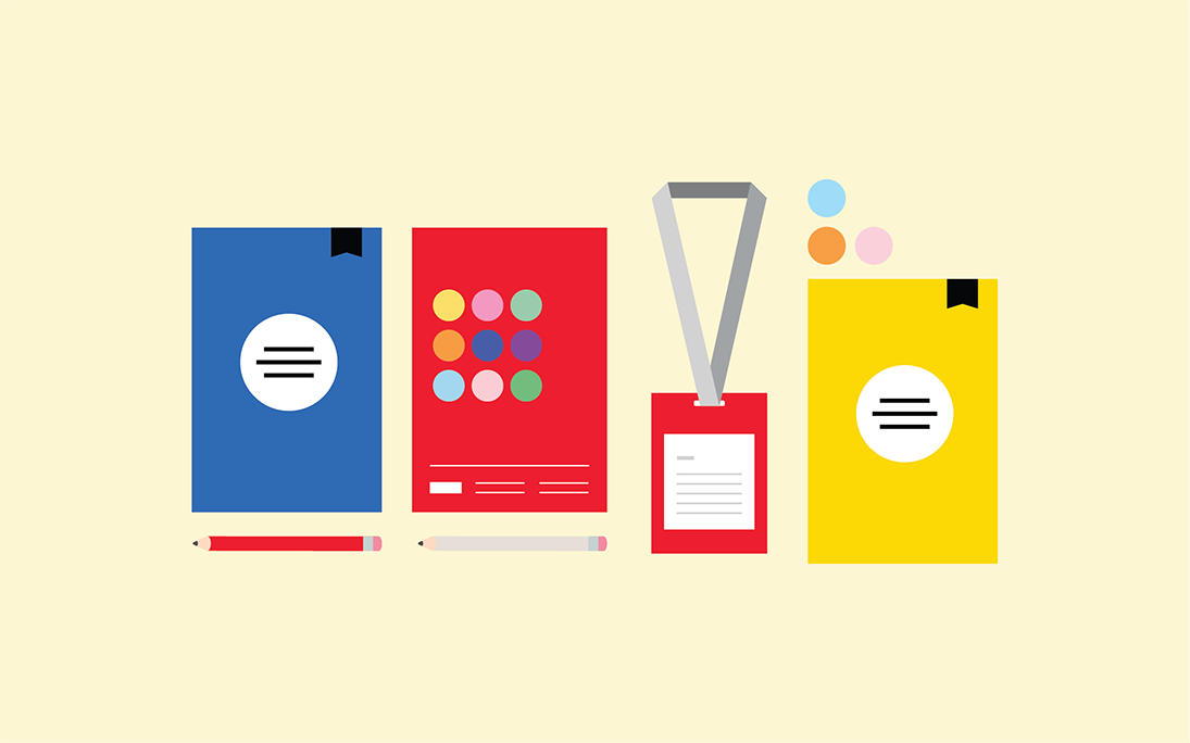 Maths conference materials including a blue workbook, red book, a lanyard, a yellow workbook and 2 pencils