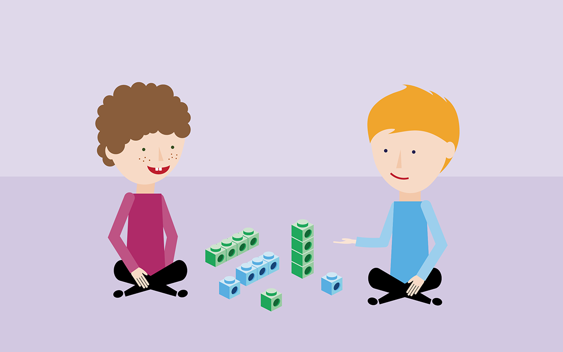 Two pupils using maths mastery manipulatives to play a game