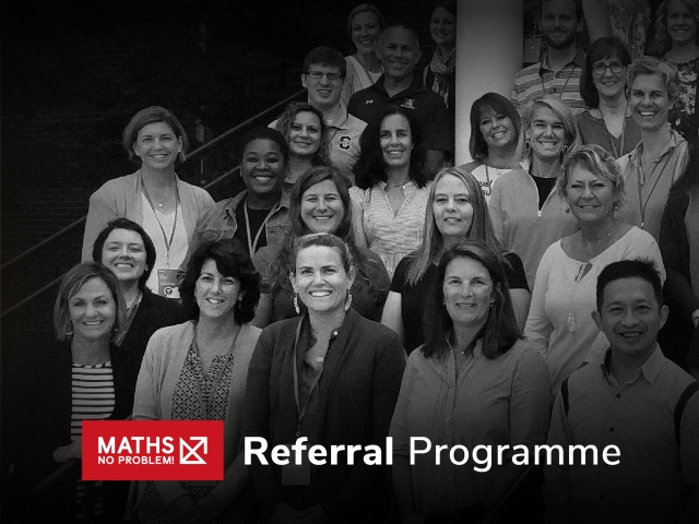 Group of teachers smiling with their hands raised.