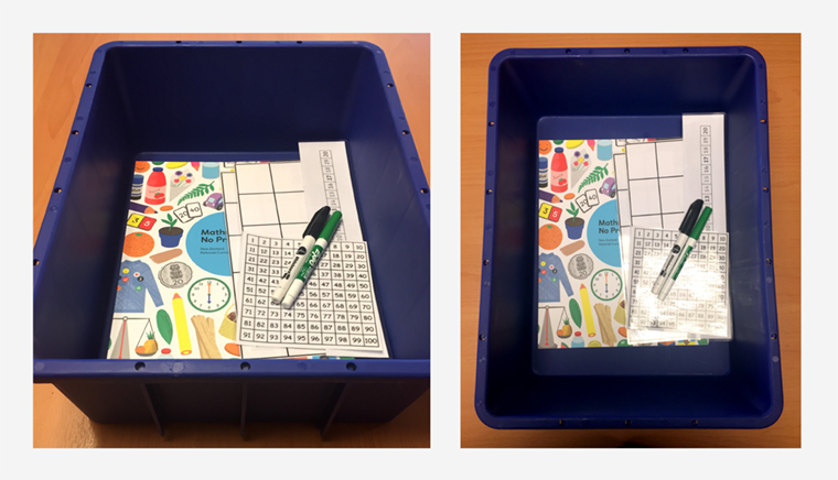 A Maths — No Problem! textbook, a number chart, and other essential primary maths resources are shown neatly organised in a box.