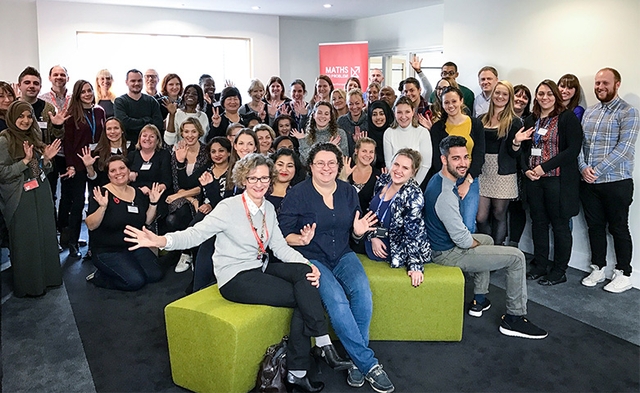 A large group photo of teachers and Maths — No Problem! staff.