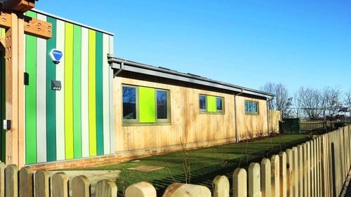 Day nursery building with colourful cladding