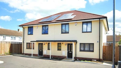 A pair of Semi-detached houses with solar panels
