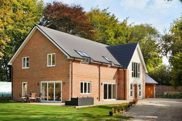 detached self build house and garden