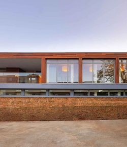 Conservative club building with corner glass balcony